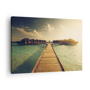 Impression sur toile - Image sur toile - Une jetée en bois menant aux maisons sur l'eau, illuminée par les rayons du soleil. - 70x50cm - Invitation chaleureuse - Décoration murale moderne pour le salon et la chambre ARTTOR