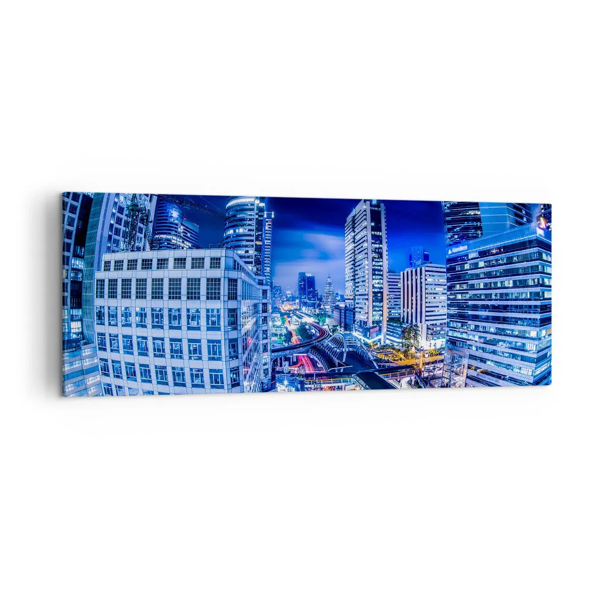 Impression sur toile - Image sur toile - Panorama nocturne de la ville avec gratte-ciels et lampadaires - 140x50cm - Rythmes de la ville nocturne - Décoration murale moderne pour le salon et la chambre ARTTOR