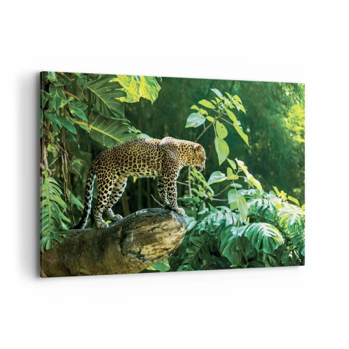 Impression sur toile - Image sur toile - Un léopard debout sur un rocher entouré de végétation tropicale - 100x70cm - À la chasse? - Décoration murale moderne pour le salon et la chambre ARTTOR