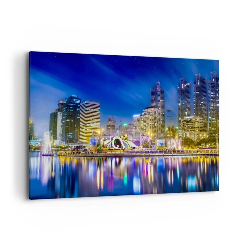 Impression sur toile - Image sur toile - Panorama nocturne de la ville avec les lumières reflétées sur l'eau - 100x70cm - Nuit arc-en-ciel de la métropole - Décoration murale moderne pour le salon et la chambre ARTTOR