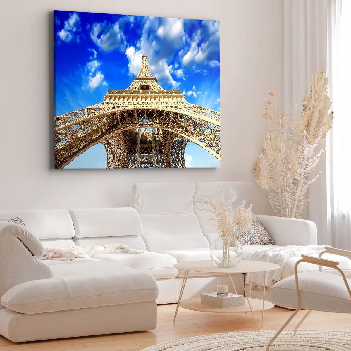 Impression sur toile - Image sur toile - La Tour Eiffel vue d'en bas contre un ciel bleu - 70x50cm - Atteindre le ciel et les nuages - Décoration murale moderne pour le salon et la chambre ARTTOR