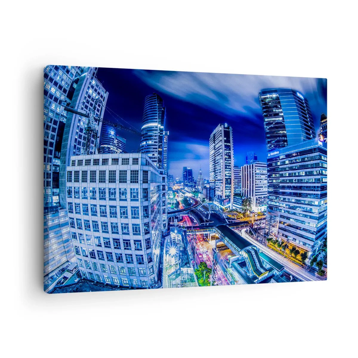 Impression sur toile - Image sur toile - Panorama nocturne de la ville avec gratte-ciels et lampadaires - 70x50cm - Rythmes de la ville nocturne - Décoration murale moderne pour le salon et la chambre ARTTOR