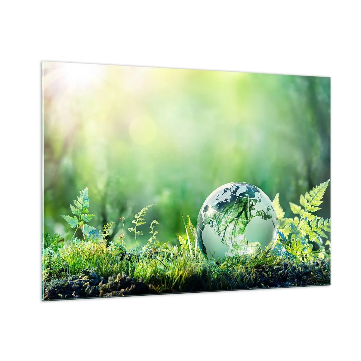 Impression sur verre - Image sur verre - Une boule de verre avec une carte du monde sur un fond de nature verdoyante - 100x70cm - La planette verte - Décoration murale moderne pour le salon et la chambre ARTTOR