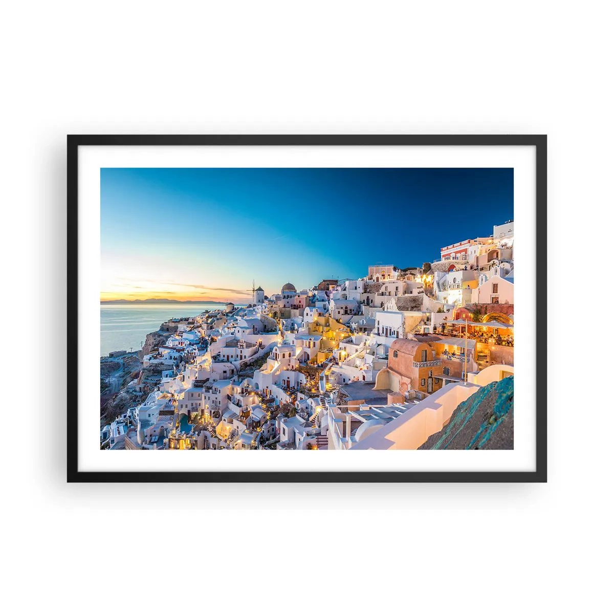 Affiche dans un cadre noir - Poster - Vue d'une ville grecque au coucher du soleil - 70x50cm - L'essence de la grecque - Décoration murale moderne pour le salon et la chambre ARTTOR