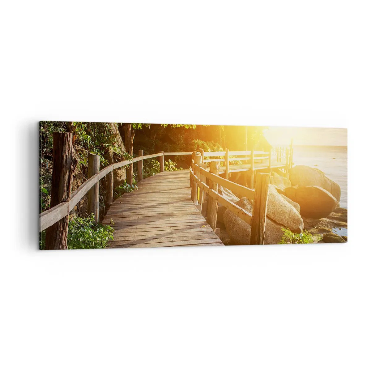 Impression sur toile - Image sur toile - Un pont en bois au milieu de la verdure menant à la mer sous les rayons du soleil - 140x50cm - Un autre tour, un autre miracle - Décoration murale moderne pour le salon et la chambre ARTTOR