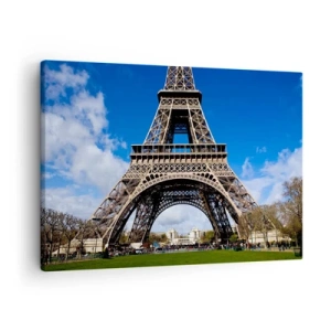 Impression sur toile - Image sur toile - La Tour Eiffel sur fond de ciel bleu et de parc verdoyant - 70x50cm - Tout Paris à ses pieds - Décoration murale moderne pour le salon et la chambre ARTTOR