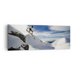 Impression sur toile - Image sur toile - Un snowboardeur saute d'une falaise avec des montagnes enneigées en arrière-plan. - 140x50cm - Liberté sans limite - Décoration murale moderne pour le salon et la chambre ARTTOR