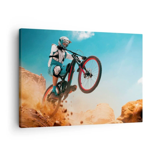 Impression sur toile - Image sur toile - Un vététiste effectue un saut sur fond de rochers - 70x50cm - Démon de la folie du vélo - Décoration murale moderne pour le salon et la chambre ARTTOR