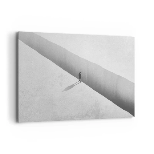 Impression sur toile - Image sur toile - Une silhouette solitaire se tient au-dessus d'un gouffre profond dans un décor monochrome. - 100x70cm - Un objectif clair - Décoration murale moderne pour le salon et la chambre ARTTOR
