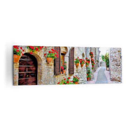 Impression sur toile - Image sur toile - Une rue étroite avec des bâtiments en pierre décorés de pots de fleurs - 160x50cm - Ambiance italienne - Décoration murale moderne pour le salon et la chambre ARTTOR