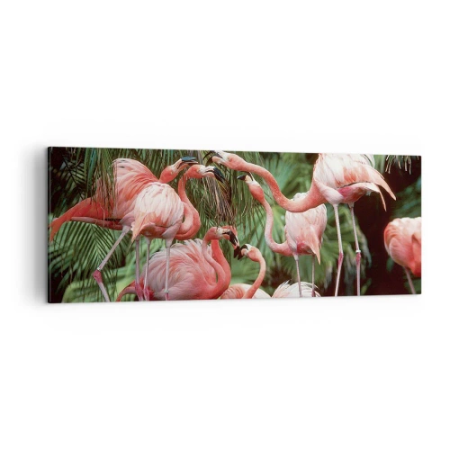 Impression sur toile - Image sur toile - Un groupe de flamants roses dans un cadre tropical entouré de palmiers - 140x50cm - Potins d'après-midi - Décoration murale moderne pour le salon et la chambre ARTTOR