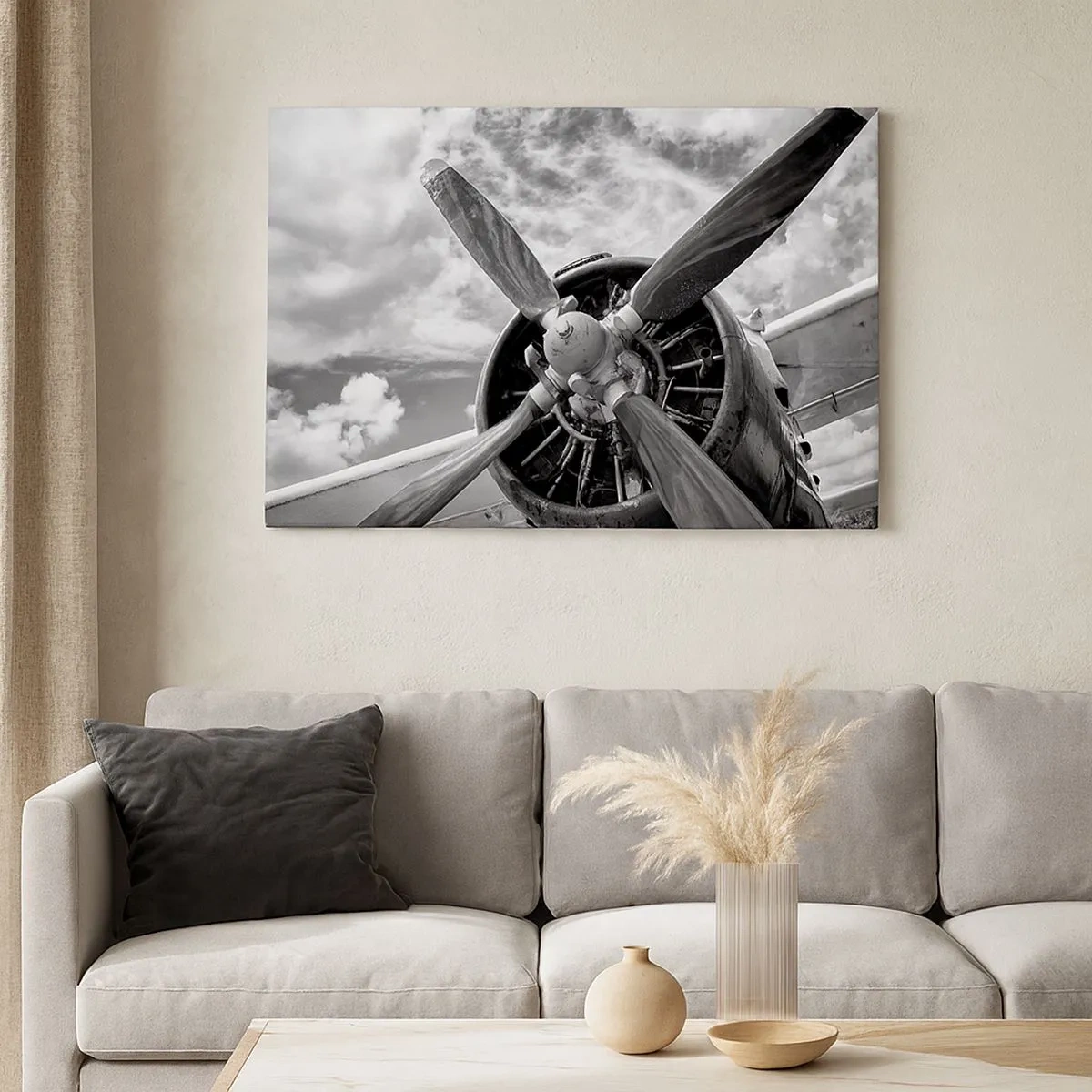 Impression sur toile - Image sur toile - Une photo en noir et blanc d'une hélice d'avion contre un ciel dynamique. - 70x50cm - Dompteur de ciel - Décoration murale moderne pour le salon et la chambre ARTTOR