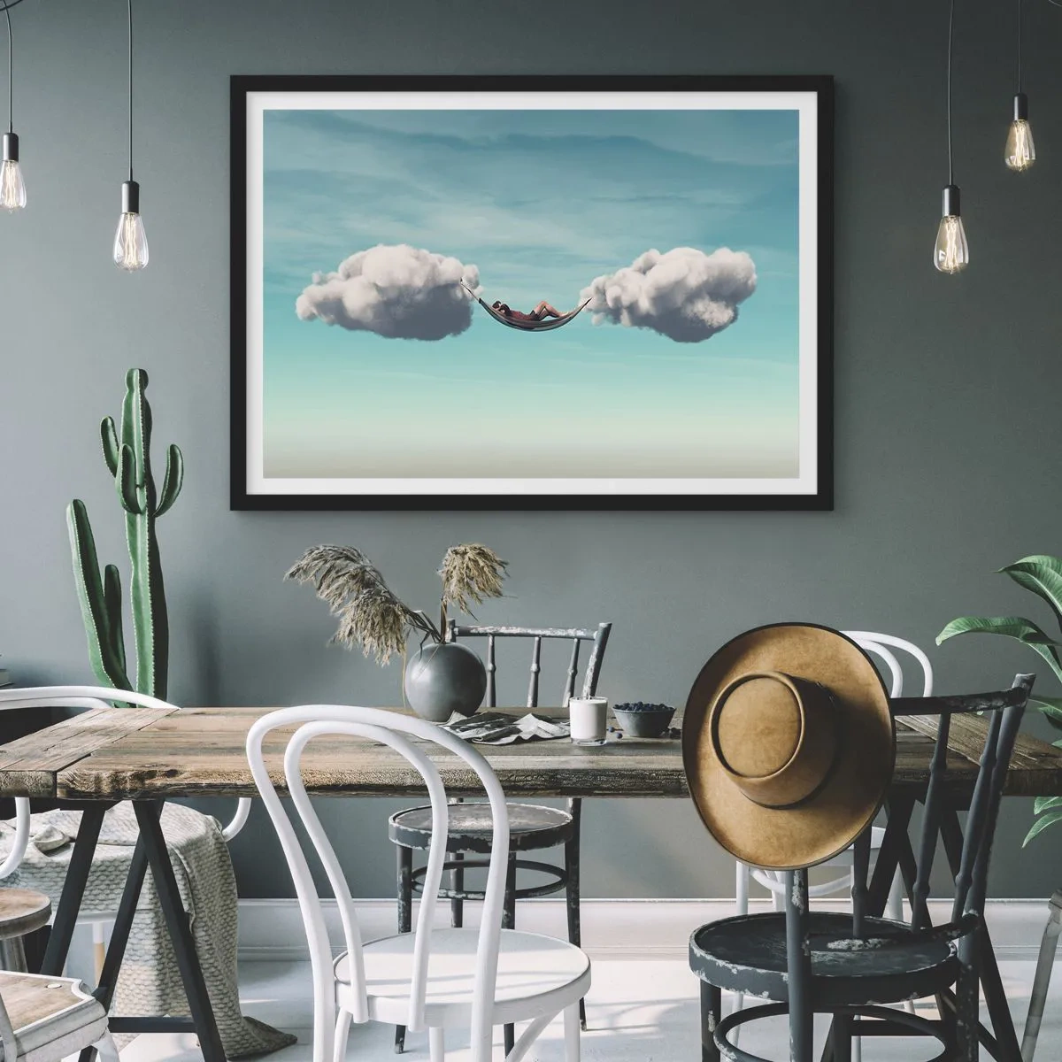Affiche dans un cadre noir - Poster - Une personne se détendant dans un hamac suspendu dans les nuages - 70x50cm - Instant de bonheur - Décoration murale moderne pour le salon et la chambre ARTTOR