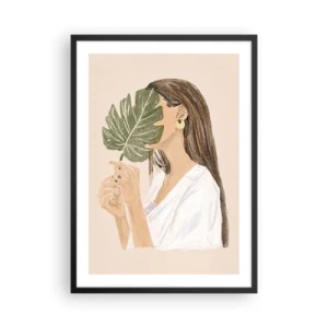 Affiche dans un cadre noir - Poster - Une femme se couvrant le visage avec une feuille de monstera. - 50x70cm - Portrait mystérieux avec un éventail - Décoration murale moderne pour le salon et la chambre ARTTOR