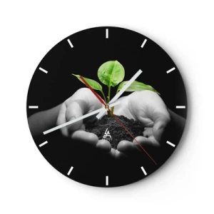 Horloge murale - Pendule murale - Une pousse verte tenue dans les mains sur un fond noir - 30x30cm - J'aime la nature, je la protège - Décoration murale moderne pour le salon, la cuisine et la chambre ARTTOR
