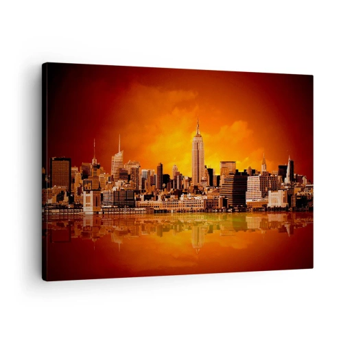 Impression sur toile - Image sur toile - Panorama de la ville au coucher du soleil avec les bâtiments se reflétant dans l'eau - 70x50cm - Panorama de grande ville en jaune et bronze - Décoration murale moderne pour le salon et la chambre ARTTOR