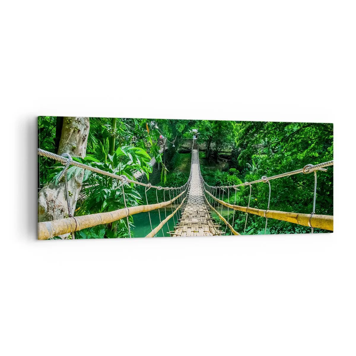 Impression sur toile - Image sur toile - Un pont suspendu en bambou entouré de verdure - 140x50cm - Pont de singe en pleine nature - Décoration murale moderne pour le salon et la chambre ARTTOR