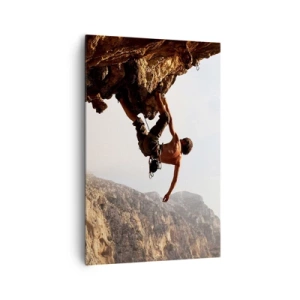 Impression sur toile - Image sur toile - Un grimpeur sur une falaise abrupte dans les montagnes au soleil - 80x120cm - Le monde rétréci dans une main sur une coupe de rocher - Décoration murale moderne pour le salon et la chambre ARTTOR