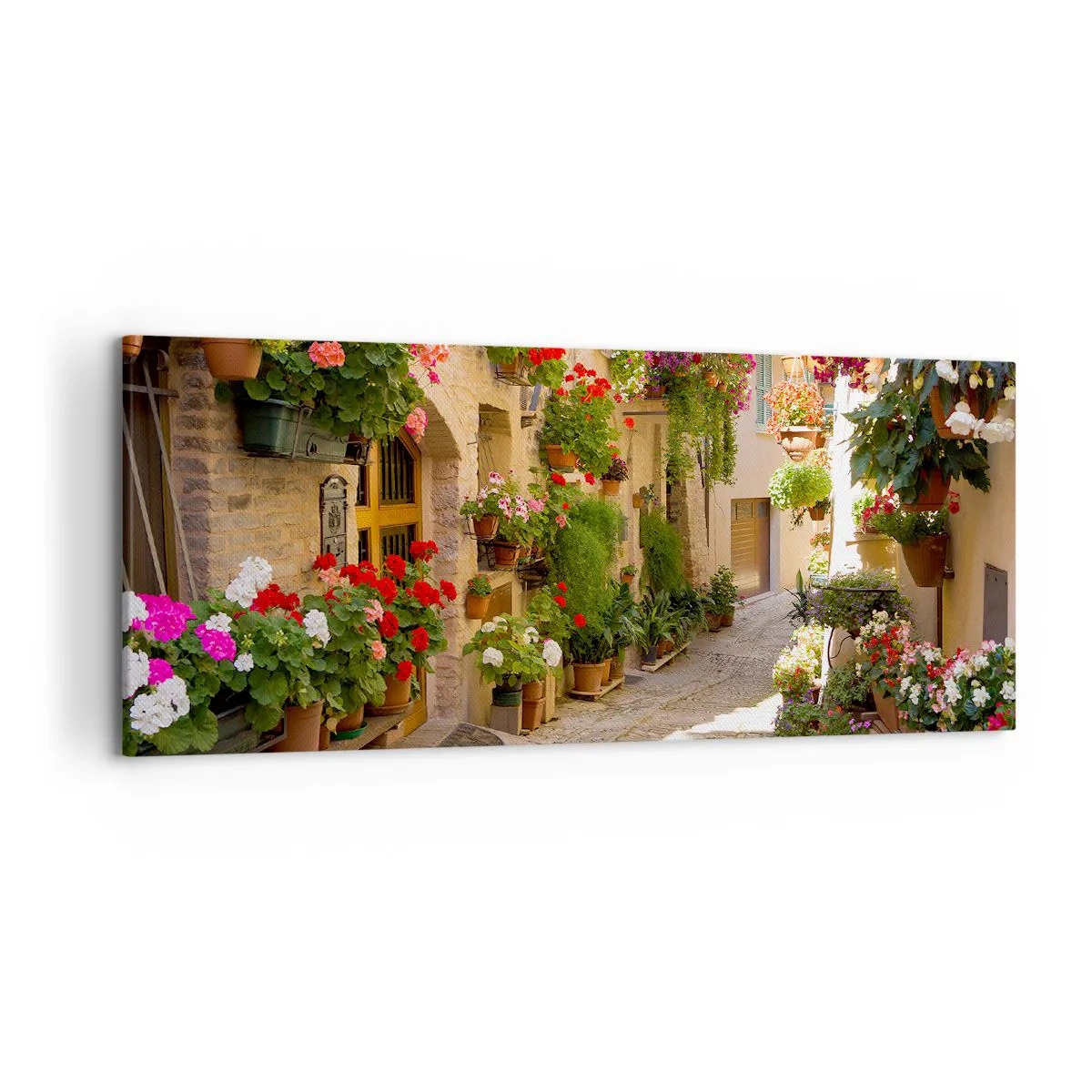Impression sur toile - Image sur toile - Une rue avec des pots de fleurs et des murs de pierre - 120x50cm - Une inondation de fleurs  - Décoration murale moderne pour le salon et la chambre ARTTOR