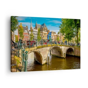 Impression sur toile - Image sur toile - Un canal pittoresque avec un pont à Amsterdam - 70x50cm - Le printemps sur le canal - Décoration murale moderne pour le salon et la chambre ARTTOR