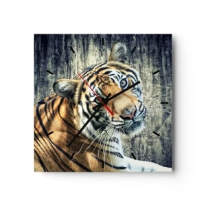 Horloge murale - Pendule murale - Un tigre couché contre un mur à la texture rugueuse - 30x30cm - Portrait dans les flots de lumière - Décoration murale moderne pour le salon et la chambre ARTTOR