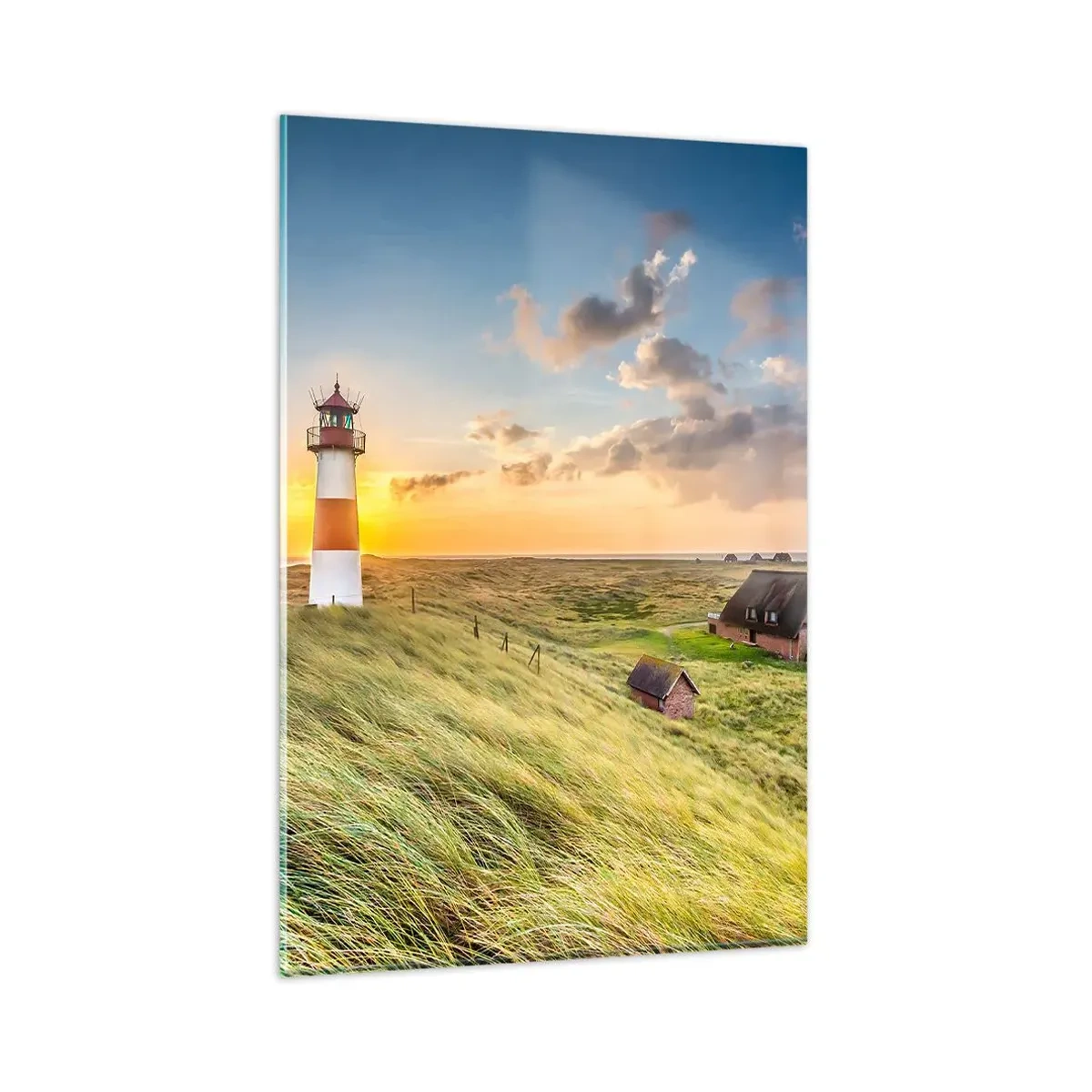 Impression sur verre - Image sur verre - Un phare avec des prairies et des maisons au soleil en arrière-plan - 80x120cm - Entre les vagues - Décoration murale moderne pour le salon et la chambre ARTTOR