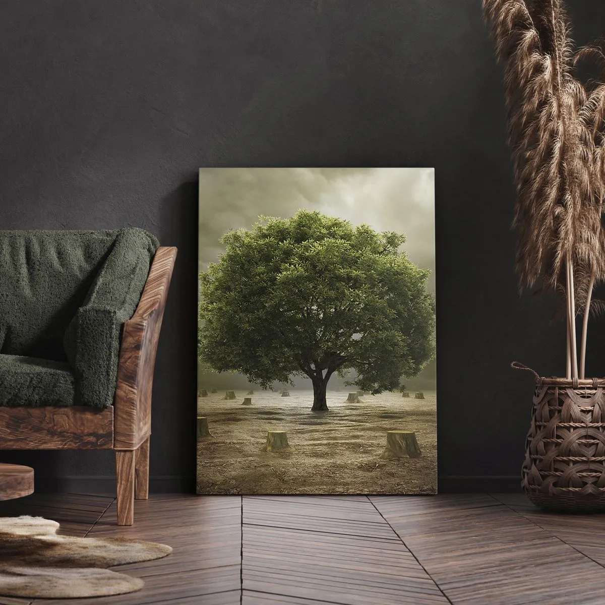 Impression sur toile - Image sur toile - Un arbre vert entouré de troncs d'arbres abattus contre un ciel nuageux - 50x70cm - Tout l'espoir - Décoration murale moderne pour le salon et la chambre ARTTOR