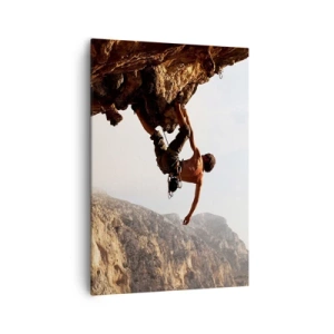 Impression sur toile - Image sur toile - Un grimpeur sur une falaise abrupte dans les montagnes au soleil - 70x100cm - Le monde rétréci dans une main sur une coupe de rocher - Décoration murale moderne pour le salon et la chambre ARTTOR