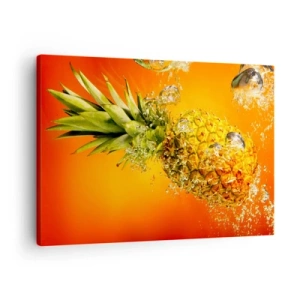 Impression sur toile - Image sur toile - Un ananas immergé dans l'eau sur un fond dégradé orange. - 70x50cm - Fraîcheur juteuse tropicale - Décoration murale moderne pour le salon et la chambre ARTTOR