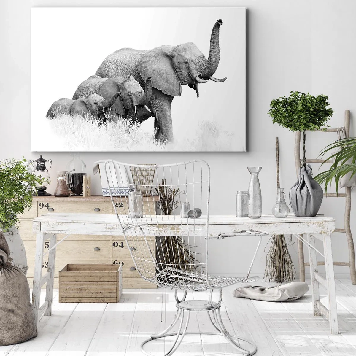 Impression sur toile - Image sur toile - Une famille d'éléphants sur fond de paysage africain en noir et blanc. - 70x50cm - Un, deux, trois - Décoration murale moderne pour le salon et la chambre ARTTOR