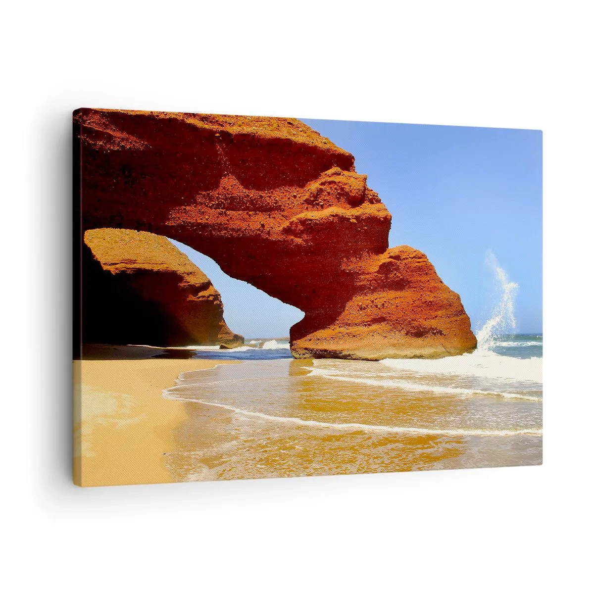 Impression sur toile - Image sur toile - Une arche rocheuse naturelle sur une plage avec un ciel bleu et des vagues - 70x50cm - L'eau et le vent depuis des milliers d'années - Décoration murale moderne pour le salon et la chambre ARTTOR