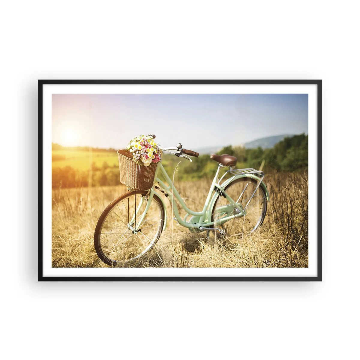 Affiche dans un cadre noir - Poster - Un vélo rétro avec un panier rempli de fleurs sur fond de prairie. - 100x70cm - Je vais rester un petit moment - Décoration murale moderne pour le salon et la chambre ARTTOR