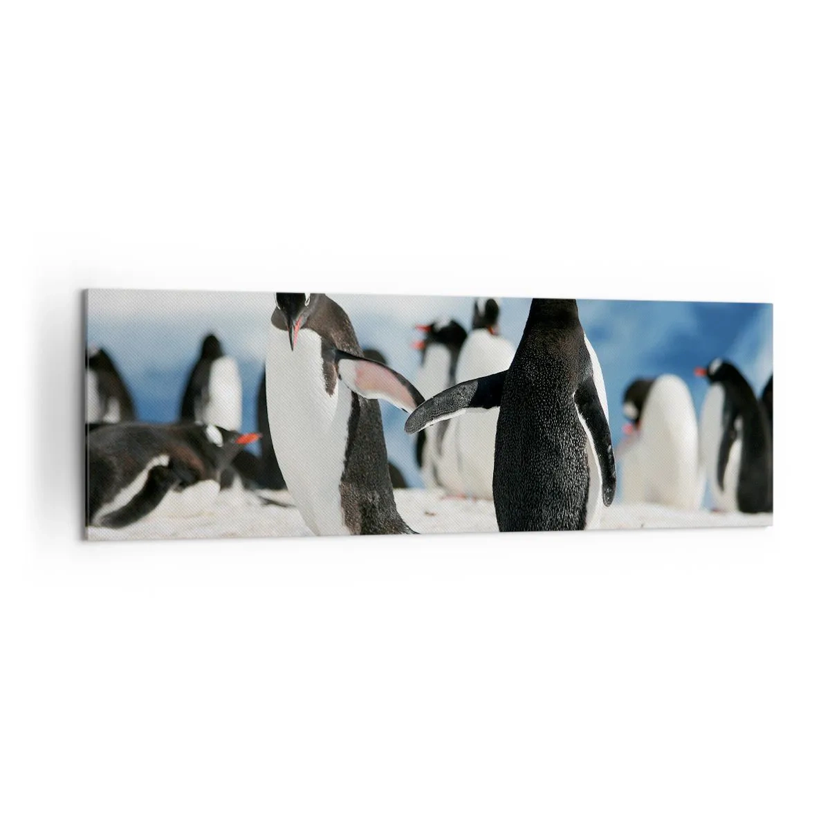 Impression sur toile - Image sur toile - Un groupe de pingouins dans la neige dans un paysage antarctique - 160x50cm - Danser dans la neige - Décoration murale moderne pour le salon et la chambre ARTTOR