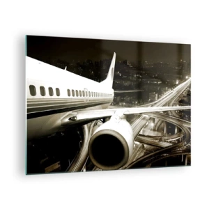 Impression sur verre - Image sur verre - Un avion au dessus de la ville la nuit avec une ambiance industrielle - 70x50cm - Vole dans la nuit - Décoration murale moderne pour le salon et la chambre ARTTOR