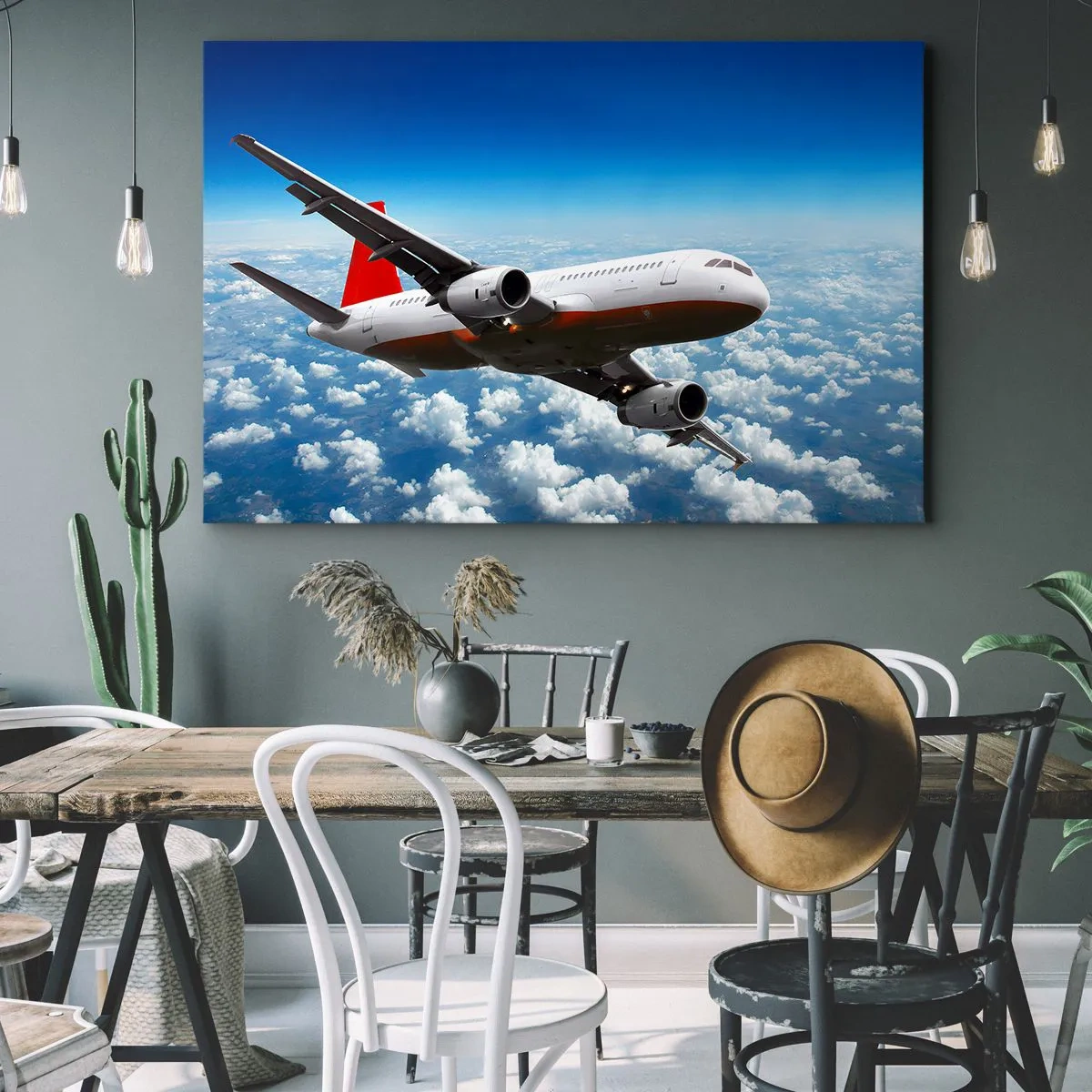 Impression sur toile - Image sur toile - Un avion de ligne volant au-dessus des nuages contre un ciel bleu. - 70x50cm - Éloignez-vous de tout - Décoration murale moderne pour le salon et la chambre ARTTOR