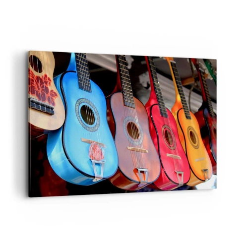 Impression sur toile - Image sur toile - Des guitares acoustiques colorées sont accrochées en rangée dans une exposition - 100x70cm - Ambiance latine - Décoration murale moderne pour le salon et la chambre ARTTOR