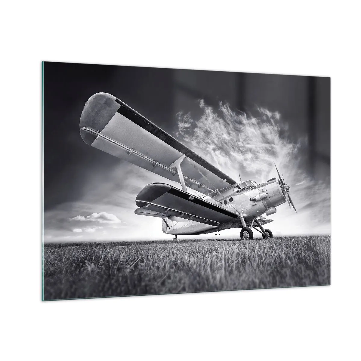 Impression sur verre - Image sur verre - Une photographie en noir et blanc d'un avion sur fond de ciel dramatique. - 100x70cm - Le pèlerin ailé - Décoration murale moderne pour le salon et la chambre ARTTOR