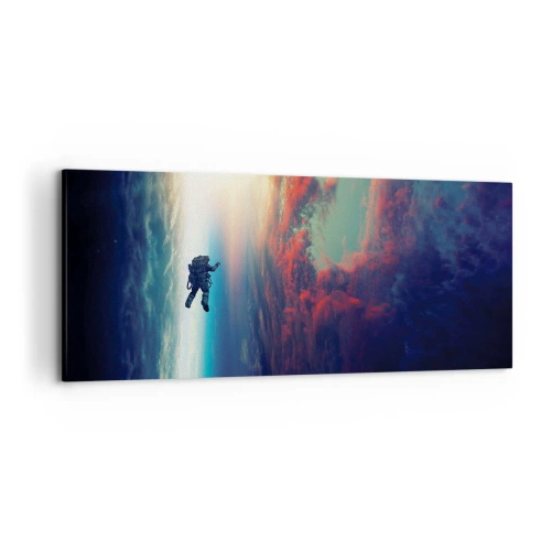 Impression sur toile - Image sur toile - Un astronaute flottant dans l'espace au-dessus d'une Terre colorée - 120x50cm - Affronter l'univers - Décoration murale moderne pour le salon et la chambre ARTTOR