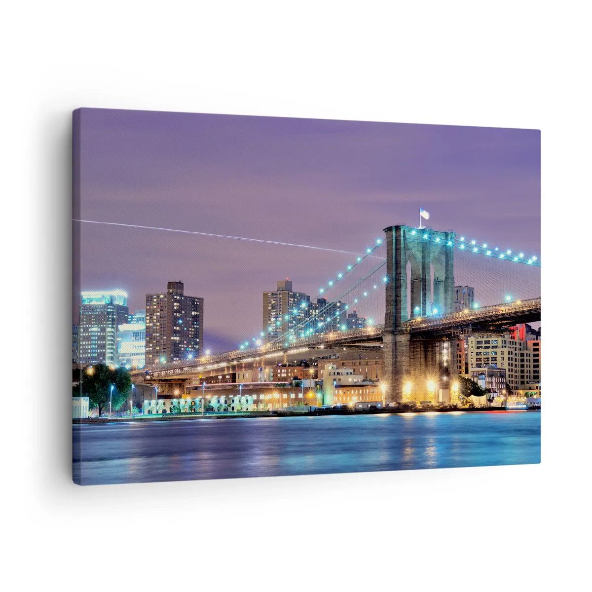 Impression sur toile - Image sur toile - Le pont de Brooklyn la nuit avec la ville illuminée en arrière-plan - 70x50cm - Depuis de nombreuses années le pont de Brooklyn - Décoration murale moderne pour le salon et la chambre ARTTOR