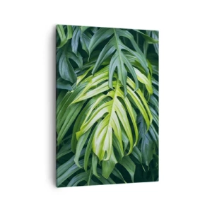 Impression sur toile - Image sur toile - Feuilles vertes dans un arrangement tropical dense - 50x70cm - Immergez-vous dans la fraîcheur - Décoration murale moderne pour le salon et la chambre ARTTOR