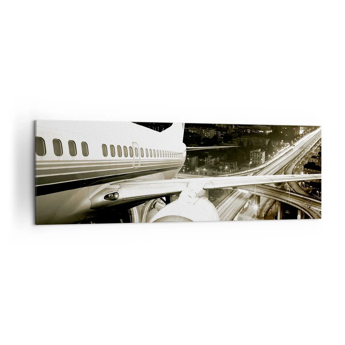 Impression sur toile - Image sur toile - Un avion au-dessus d'une ville nocturne avec des autoroutes illuminées - 160x50cm - Vole dans la nuit - Décoration murale moderne pour le salon et la chambre ARTTOR
