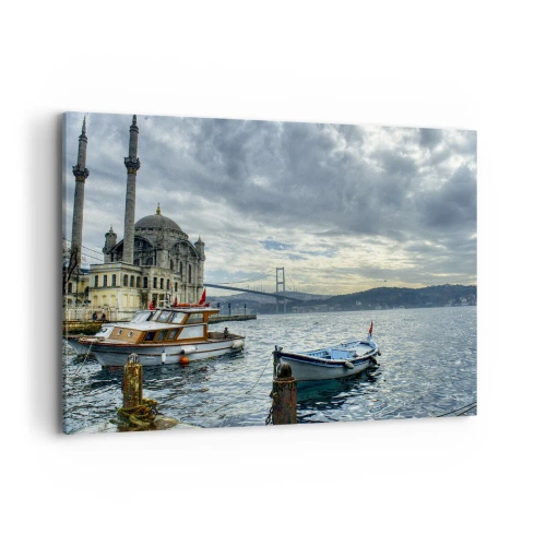 Impression sur toile - Image sur toile - Un bâtiment historique sur l'eau avec des bateaux et un pont en arrière-plan - 120x80cm - Aux confins des mondes - Décoration murale moderne pour le salon et la chambre ARTTOR
