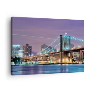 Impression sur toile - Image sur toile - Le pont de Brooklyn la nuit avec la ville illuminée en arrière-plan - 70x50cm - Depuis de nombreuses années le pont de Brooklyn - Décoration murale moderne pour le salon et la chambre ARTTOR